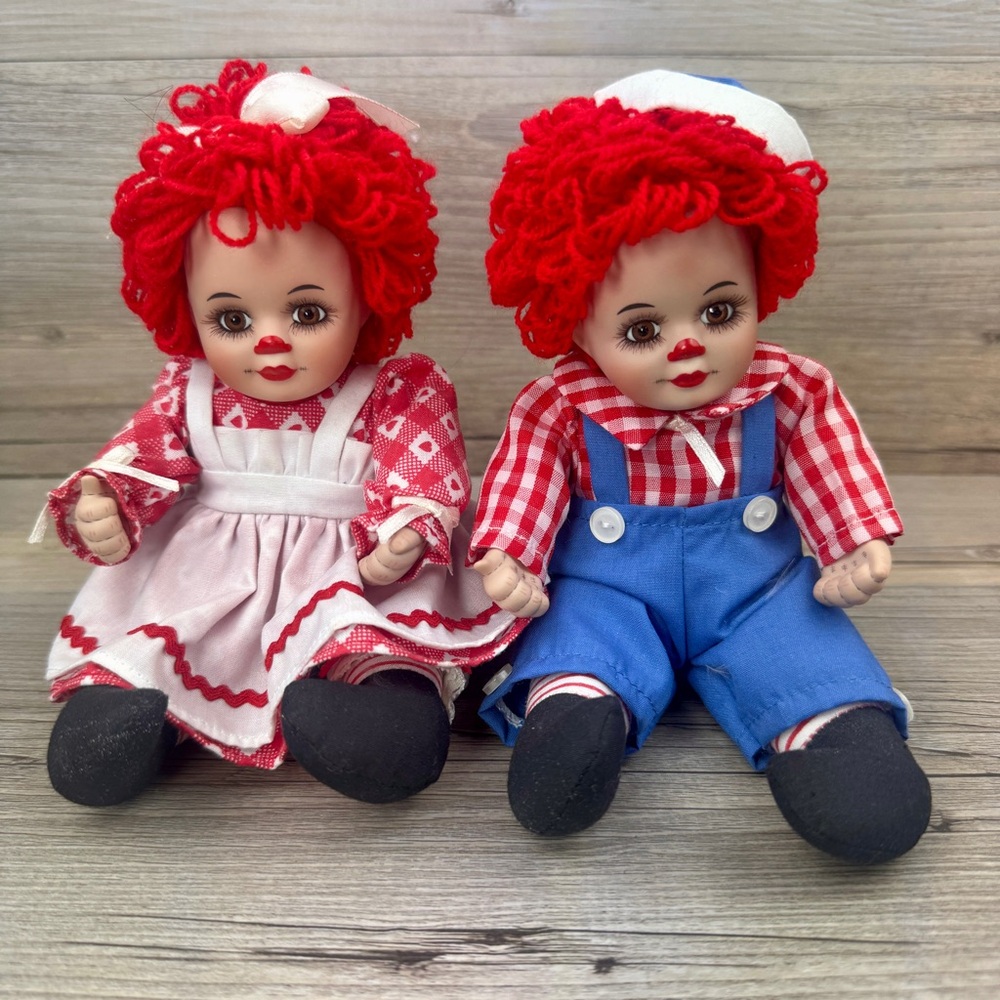 VTG Marie Osmond Raggedy Ann and Andy porcelain twin dolls.